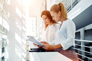 Women reviewing paperwork